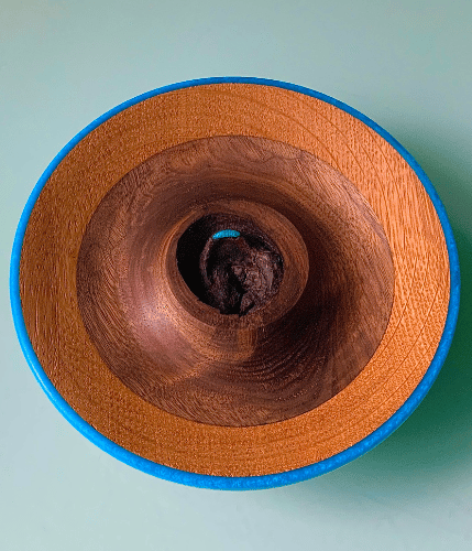 Platter with deep blue center and patterned wood frame