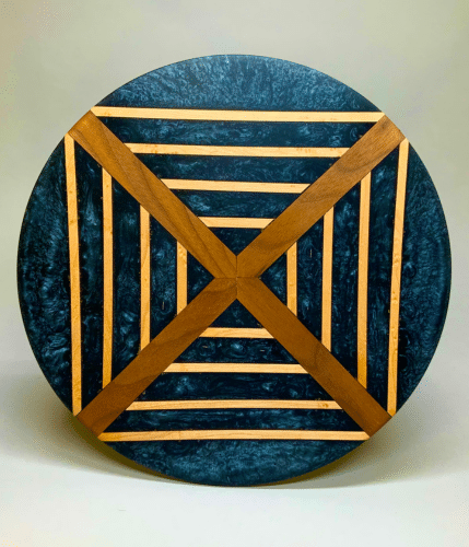 Platter with deep blue center and patterned wood frame