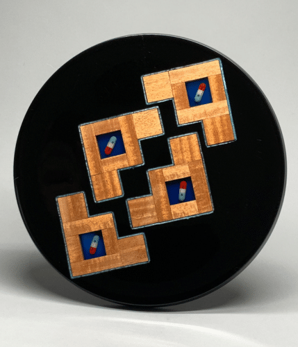 Platter with deep blue center and patterned wood frame