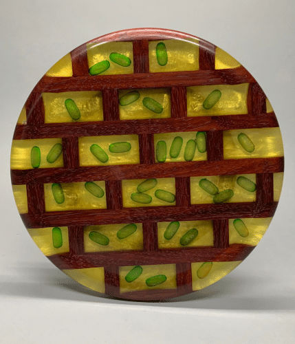 Platter with deep blue center and patterned wood frame